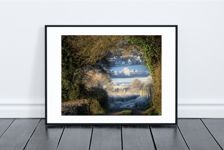 Framed art print in a modern living room setting