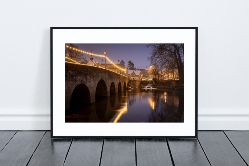 Framed art print in a modern living room setting
