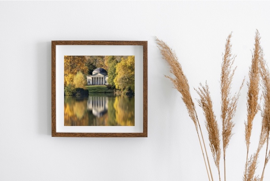 Framed art print in a modern living room setting