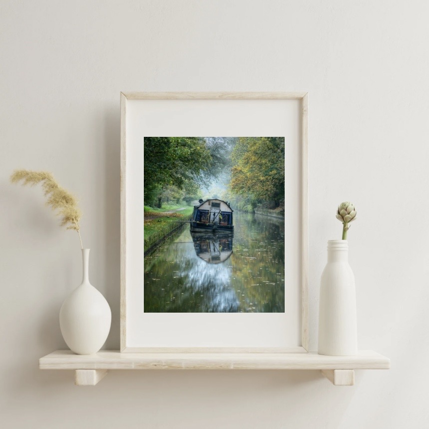 Framed art print in a modern living room setting